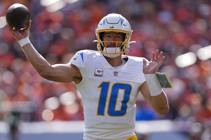 Chargers quarterback Justin Herbert passes against the Denver Broncos on Oct. 13.