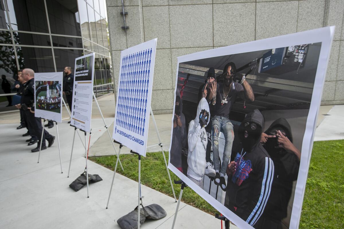 Large photographs and charts on display during a news conference