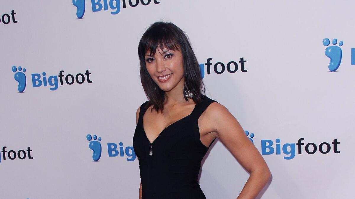 Actress Jaymee Ong arrives at the 2011 premiere of "Deep Gold" in Westwood.