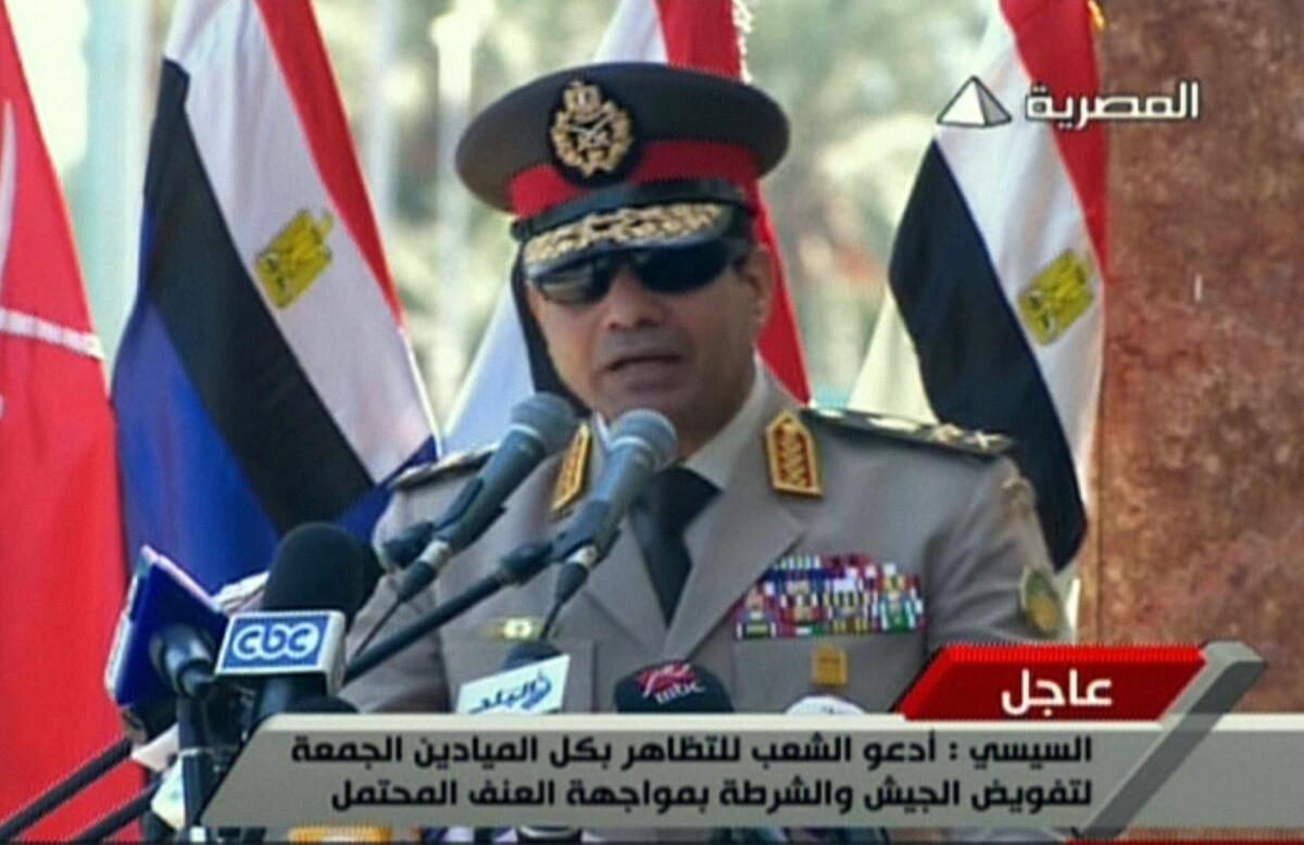 Egyptian army chief Gen. Abdel Fattah Sisi, shown in a screen capture from state television Wednesday, urged public rallies to support the military's fight against "terrorism."