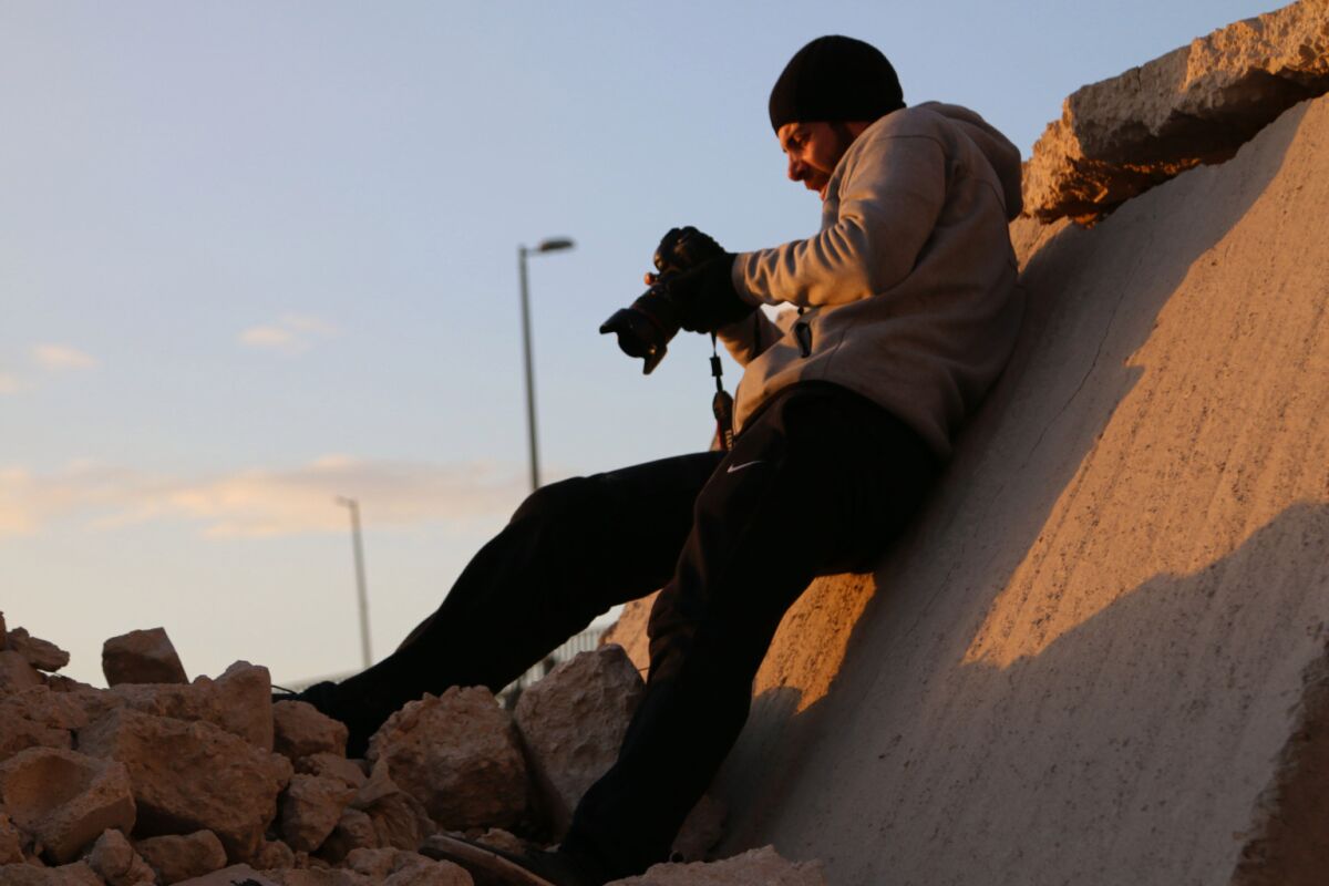 Rami Jarrah taking photos 