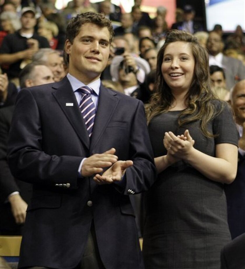 In this Sept. 3, 2008 file photo, Bristol Palin, daughter of Alaska Gov. Sarah Palin, and her then-boyfriend Levi Johnston are seen at the Republican National Convention in St. Paul, Minn. (AP Photo/Charles Rex Arbogast, File)