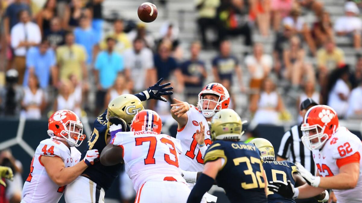 Clemson quarterback Trevor Lawrence launches a 53-yard touchdown pass against Georgia Tech on Sept. 22.