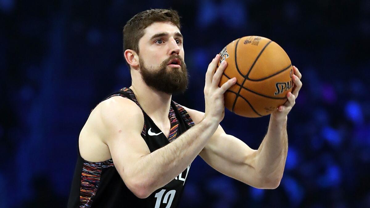 Joe Harris of the Brooklyn Nets takes a shot during the three-point contest as part of the 2019 NBA All-Star Weekend at Spectrum Center on February 16, 2019 in Charlotte, North Carolina.