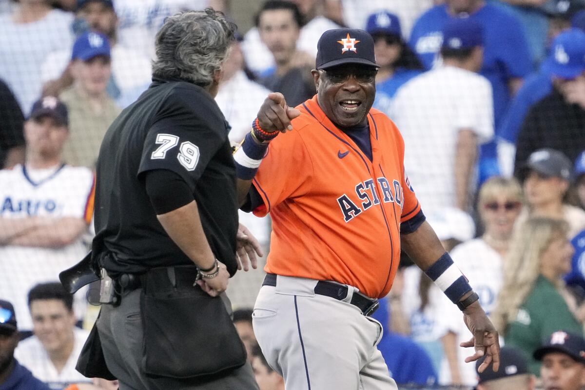 Houston Astros manager Dusty Baker argues with home plate umpire Manny Gonzalez.