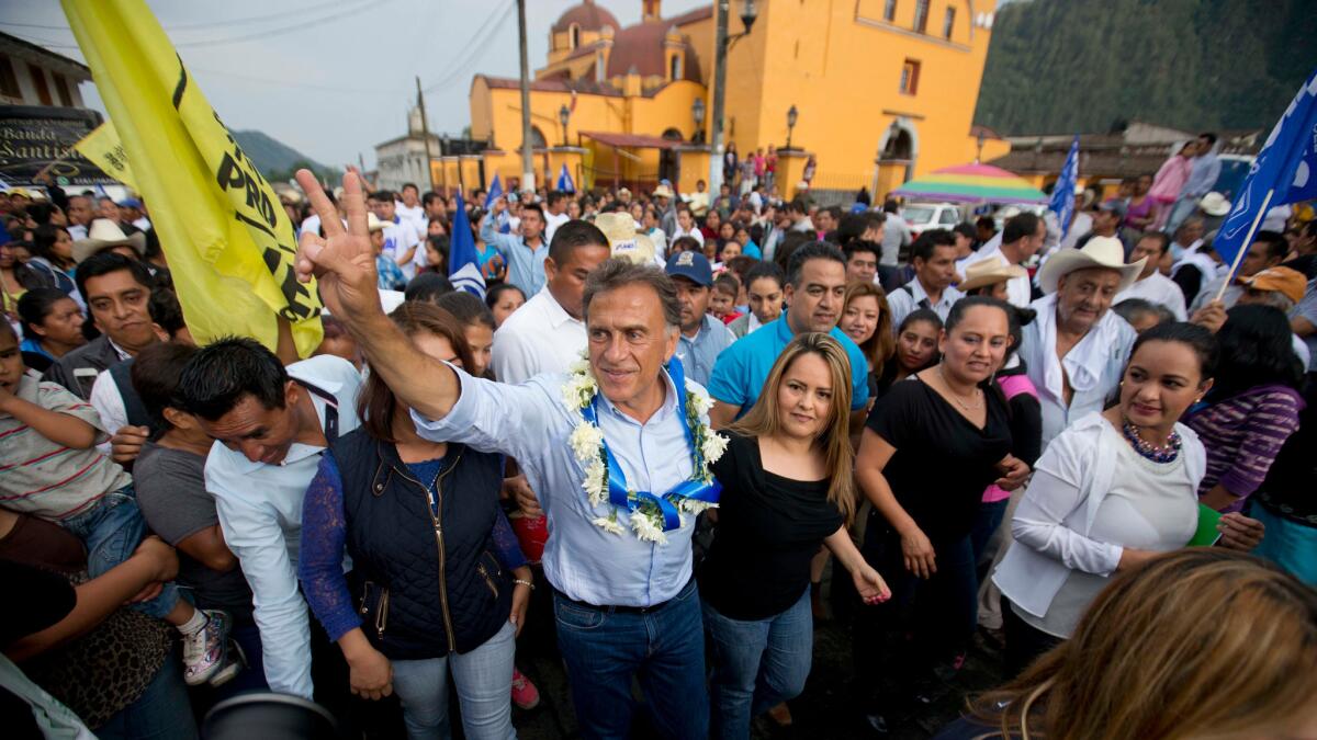 Miguel Angel Yunes Linares, seen campaigning last month, appeared to be headed for victory in the race for governor of the oil-rich Mexican state of Veracruz.