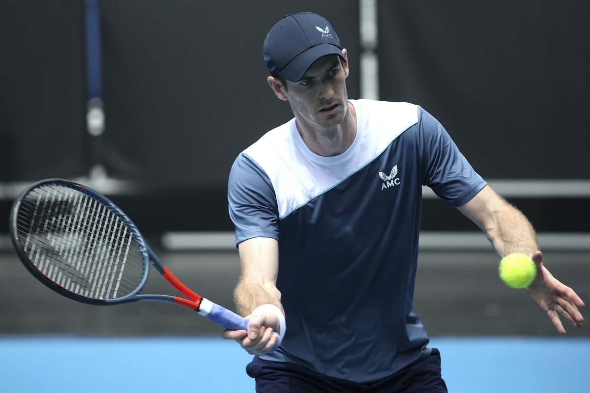 Andy Murray of Britain warms up in a practice session on John Cain Arena at Summer Set tennis tournament ahead of the Australian Open in Melbourne, Australia, Wednesday, Jan. 5, 2022. (AP Photo/Hamish Blair)