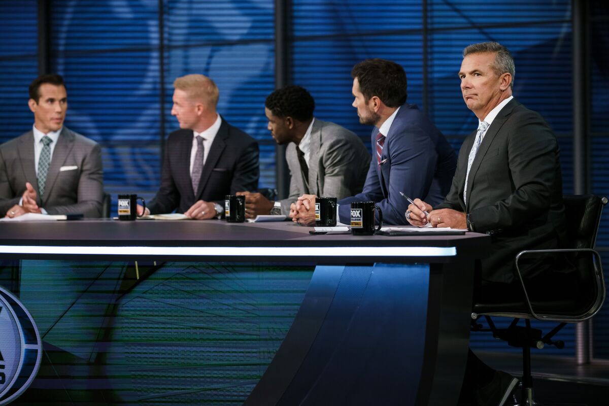 From left, Brady Quinn, Joel Klatt, Reggie Bush, Matt Leinart and Urban Meyer talk about college football.