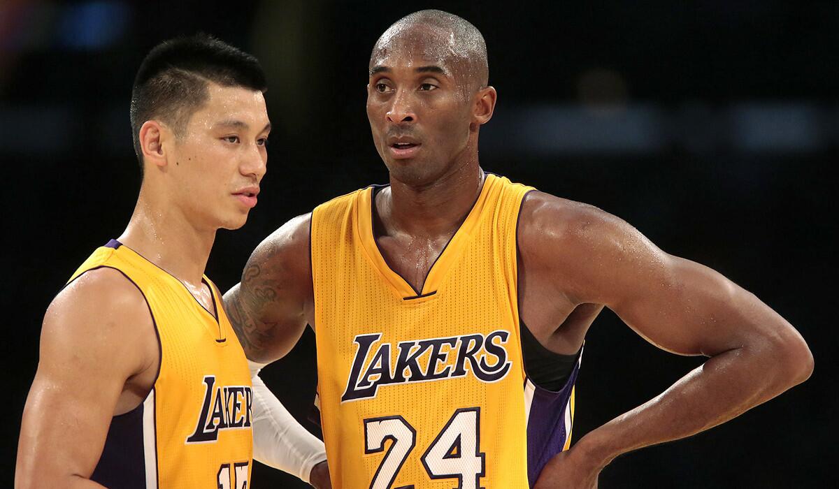 While Lakers guard Kobe Bryant (24) is playing his way back into shape, new point guard Jeremy Lin is dealing with a pair of sprained ankles.