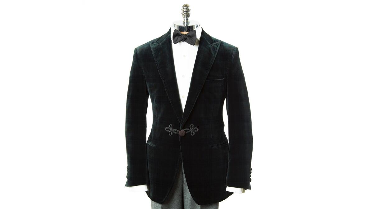 A dark bottle green velvet is an alternative to a typical blue or grey suit.