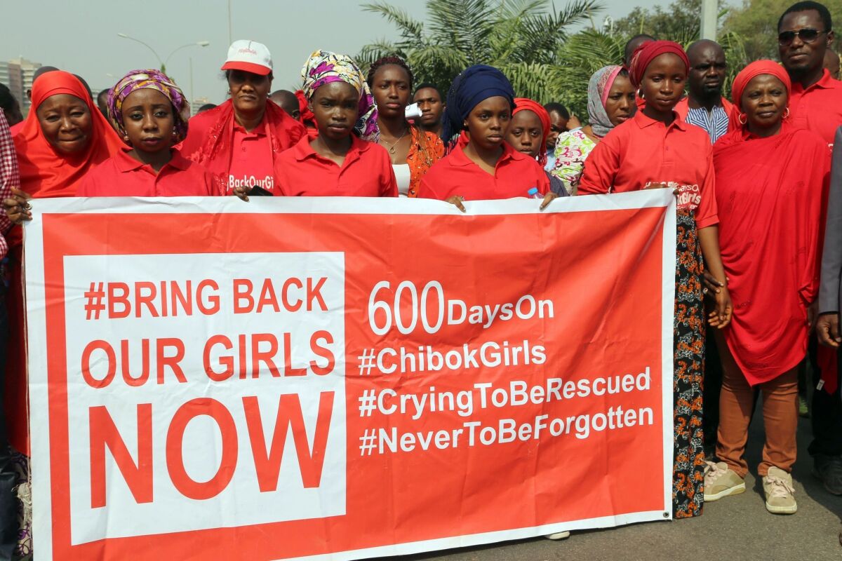 Members of the Bring Back Our Girls movement march in Abuja, Nigeria, on Jan. 14 to press for the release of girls kidnapped in 2014 from their school in Chibok.