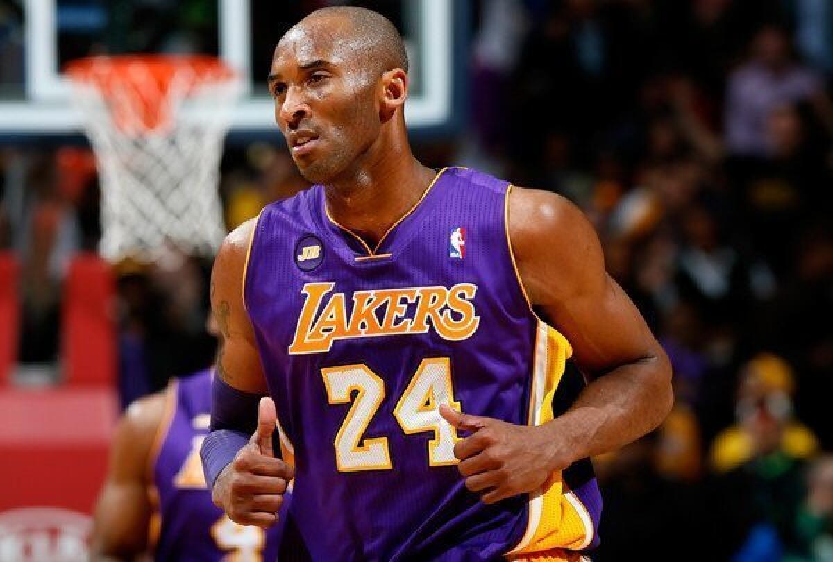 Lakers guard Kobe Bryant reacts after scoring against the Atlanta Hawks on Wednesday.