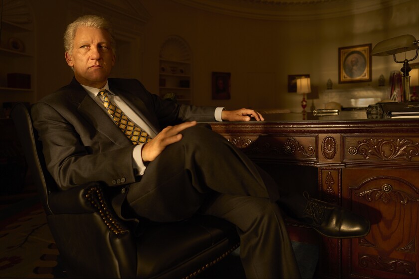 Clive Owen as President Clinton looks to the side in a scene from “Impeachment: American Crime Story”