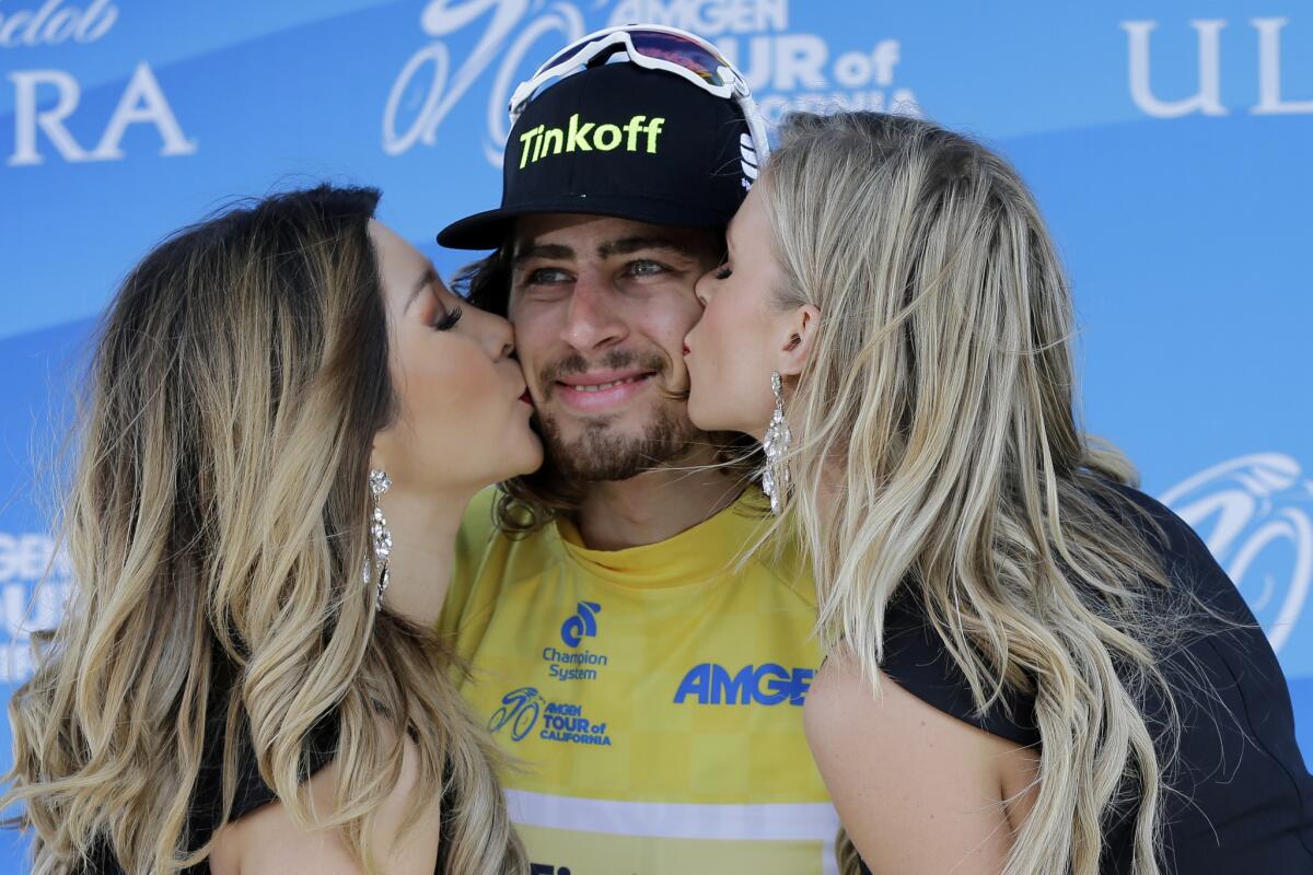Peter Sagan, center, is kissed after winning Stage 1 of the Amgen Tour of California race on May 15.