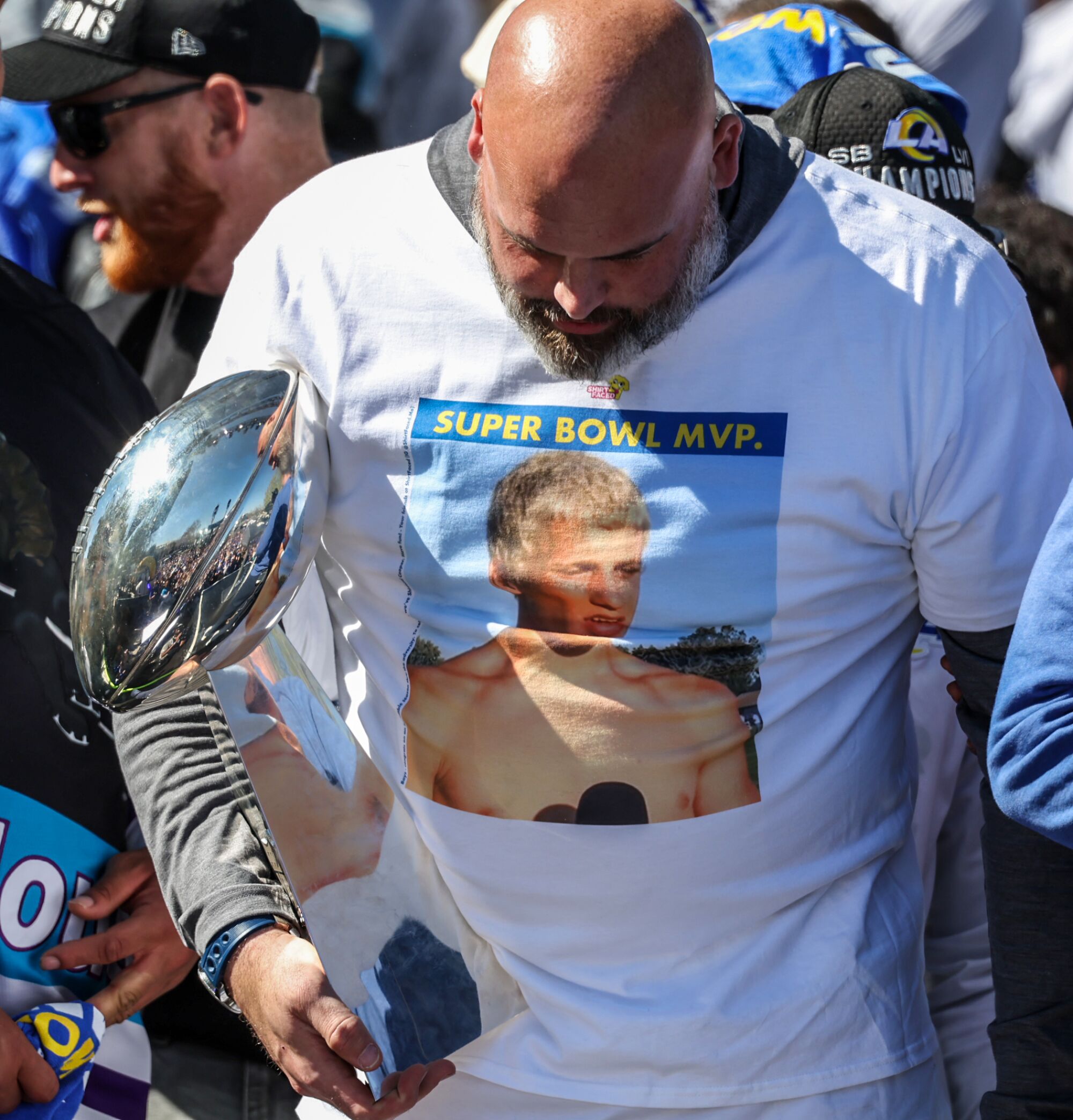 Rams lineman Andrew Whitworth dons a t-shirt featuring a young Cooper Kupp 