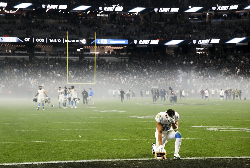 Chargers safety Alohi Gilman reacts after Sunday's loss at Las Vegas left Los Angeles out of the postseason.