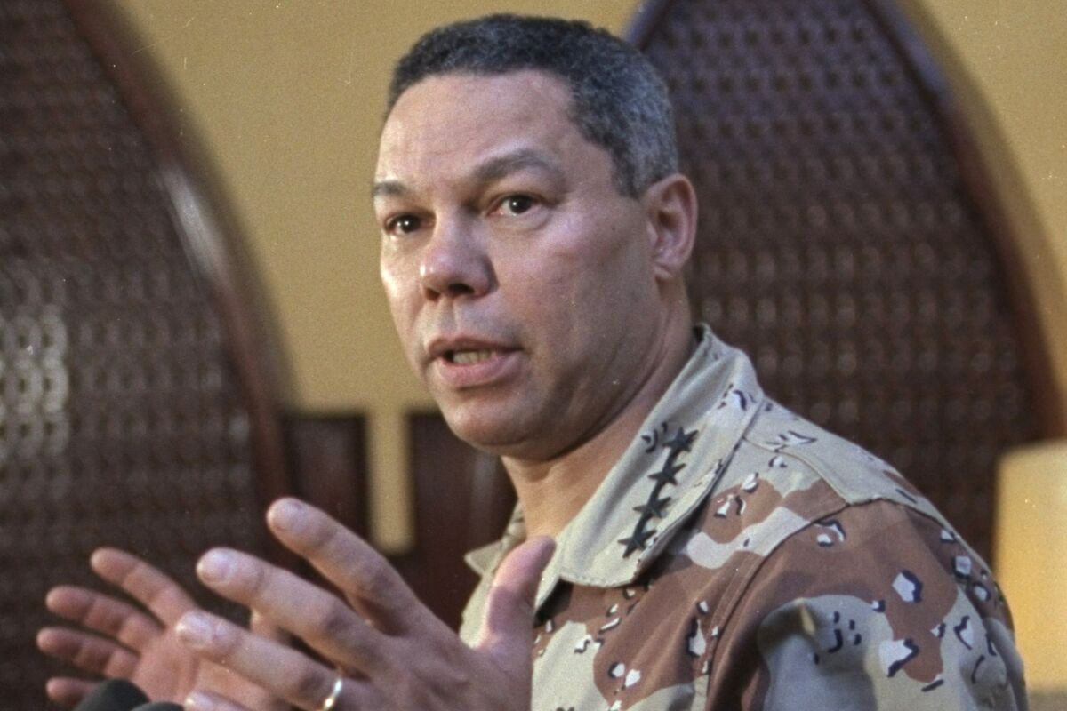 Gen. Colin Powell, chairman of the Joint Chiefs of Staff, speaks to reporters in 1990