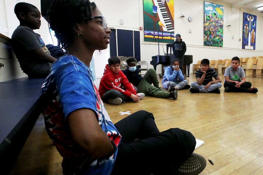 LOS ANGELES, CALIF. - DEC. 20, 2022. Students participate in a dance class offered through the Acceleration Days program at Alta Loma Elementary School in Los Angeles. After a slow start in registrations, about 72,000 Los Angeles students had signed up to be back in the classroom on their first day of winter break. (Luis Sinco / Los Angeles Times)