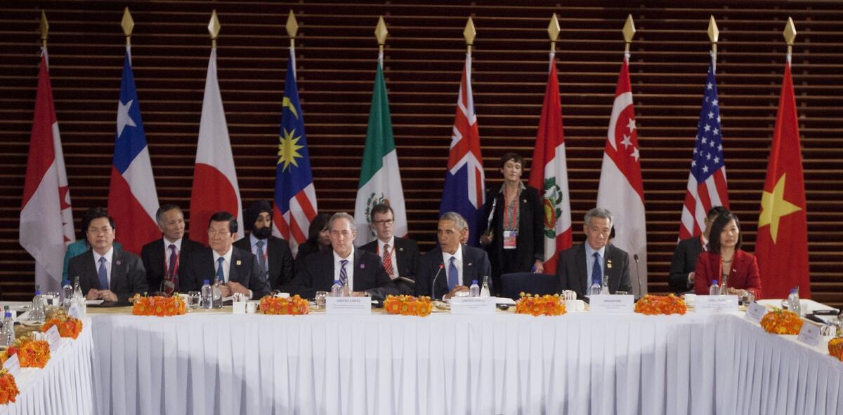 President Obama, center, speaks during his meeting with leaders of the Trans-Pacific Partnership countries in Beijing on Nov. 10, 2014.