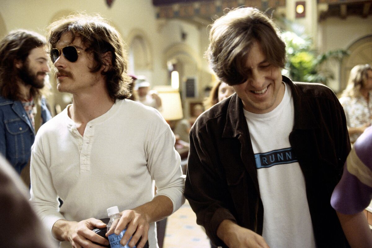 Billy Crudup as Russell Hammond with writer-director Cameron Crowe on the set of the "Almost Famous" film.