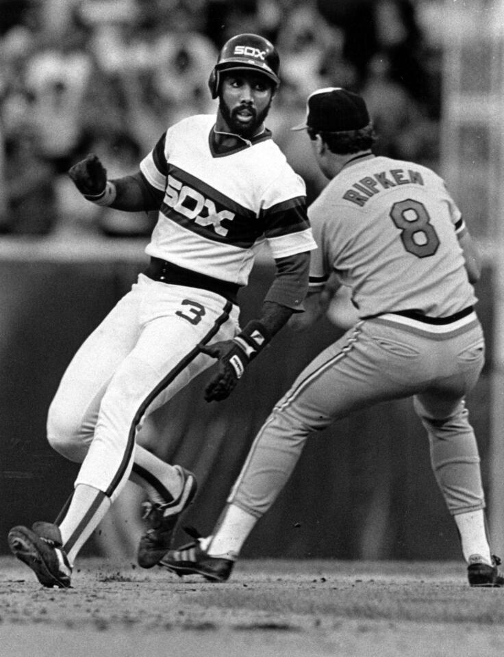 Harold Baines goes into second base standing up after doubling off the right-field wall in the sixth inning of the White Sox's 6-3 victory on July 12, 1986. Baltimore's Cal Ripken awaits the throw.