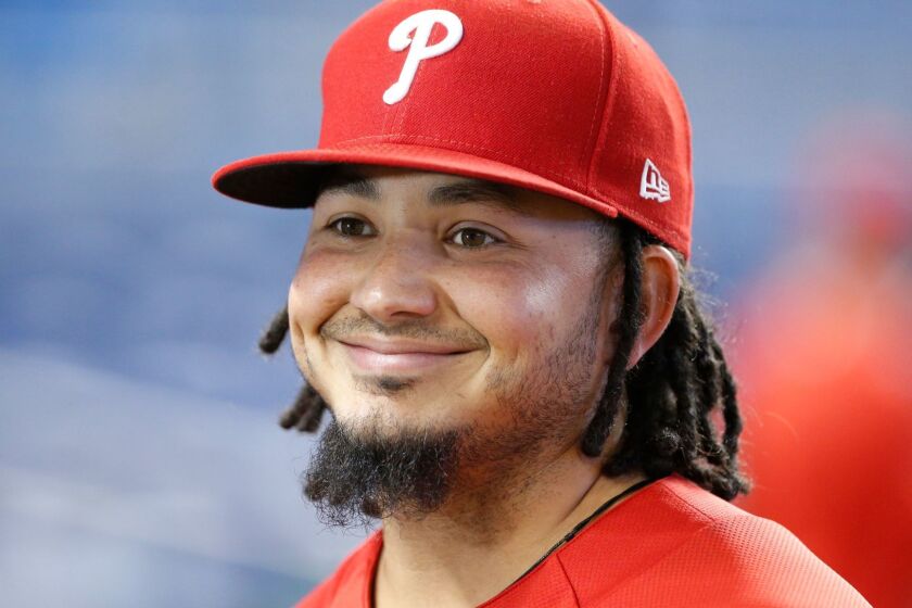 Philadelphia Phillies' Freddy Galvis smiles during an interview before the start of a baseball game against the Miami Marlins, Friday, Sept. 1, 2017, in Miami. (AP Photo/Wilfredo Lee)