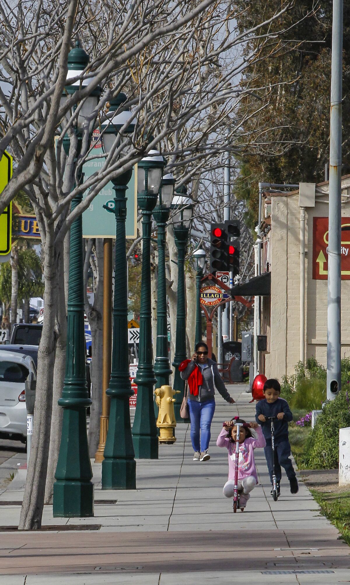 CHULA VISTA - FEB.16: A view of a sidewalk lined with street lamps as part of the completed project along Third Ave.