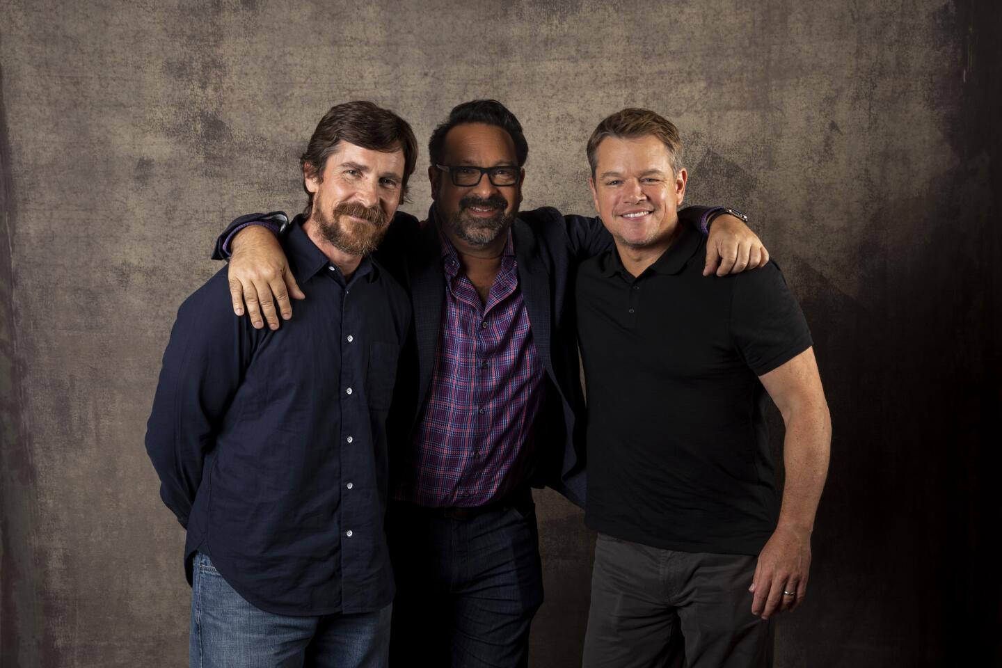 TORONTO, ONT., CAN -- SEPTEMBER 08, 2019-- Actor Christian Bale, director James Mangold and actor Matt Damon, from the film "Ford v Ferrari," photographed in the L.A. Times Photo Studio at the Toronto International Film Festival, in Toronto, Ont., Canada on September 08, 2019. (Jay L. Clendenin / Los Angeles Times)