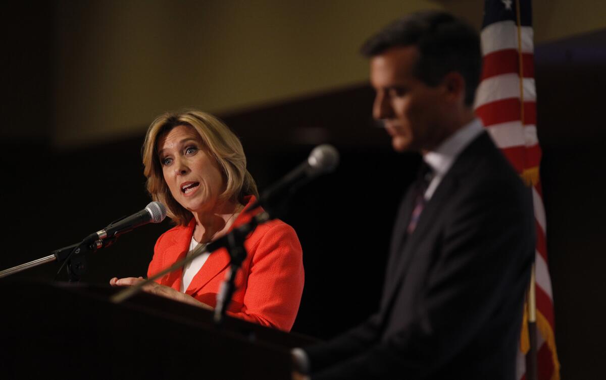 City Controller Wendy Greuel participates in a mayoral debate and town hall with City Councilman Eric Garcetti.