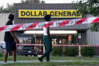 JACKSONVILLE, FLORIDA - AUGUST 27: Pedestrians walk past a Dollar General store where three people were shot and killed the day before on August 27, 2023 in Jacksonville, Florida. Police say that the attack by a gunman on Black customers at the store is being investigated as a hate crime. (Photo by Sean Rayford/Getty Images)