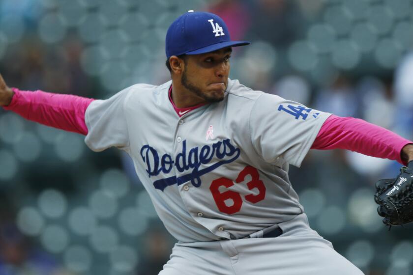 Dodgers reliever Yimi Garcia delivers a pitch during a win over the Colorado Rockies on May 10.