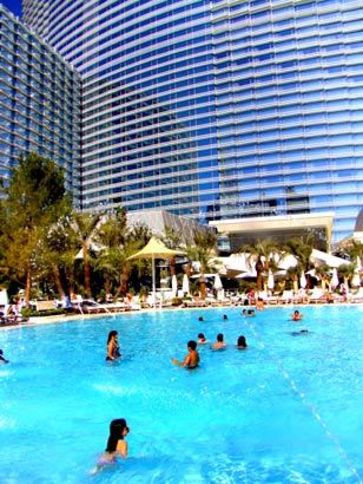 The casinos aren't the only places to play in Las Vegas. The towers of Aria loom large over one of the hotel's pools.