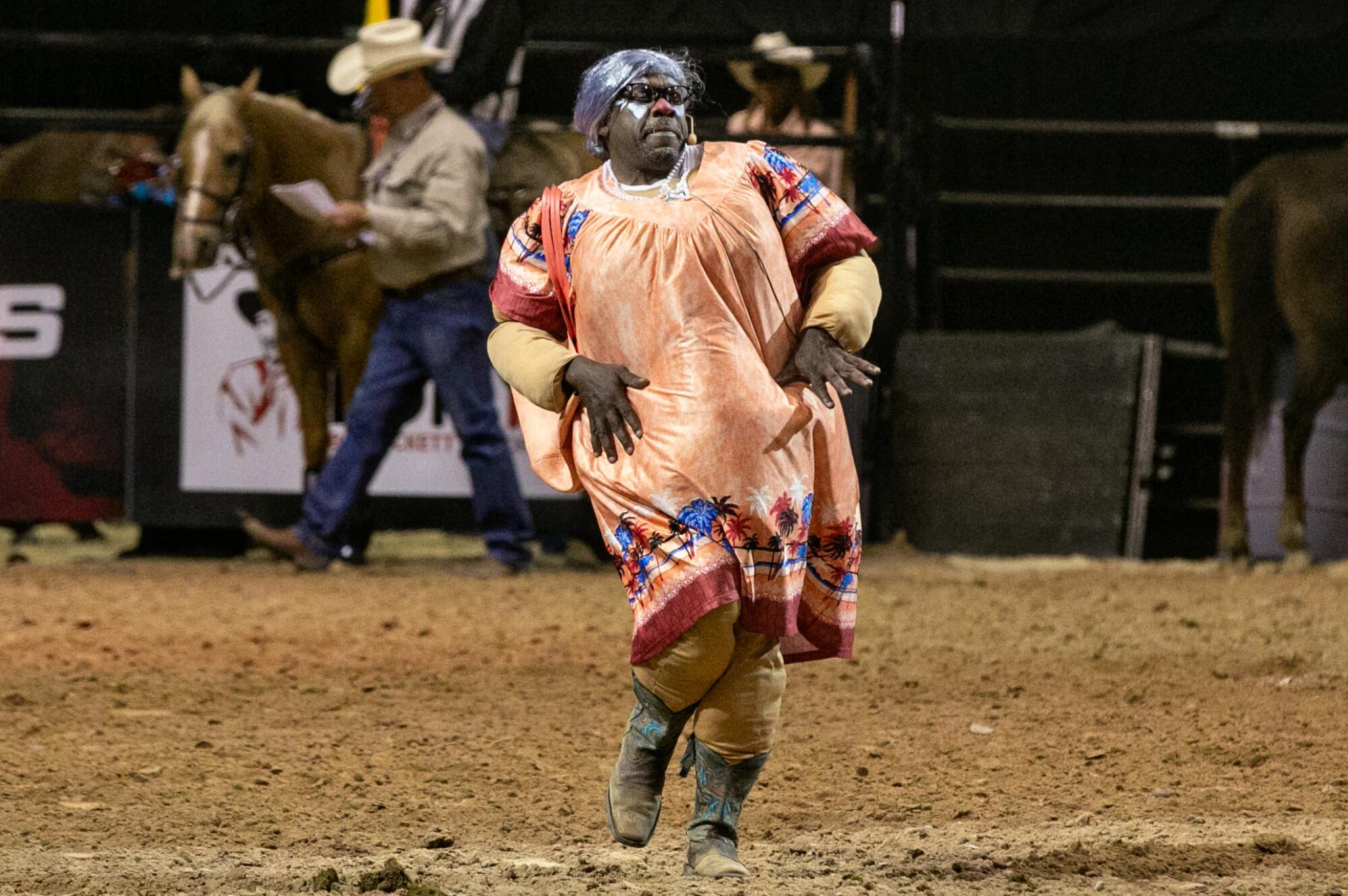 Avery Ford, a rodeo clown who performs as Spanky, entertains the crowd at the Bill Pickett Invitational Rodeo