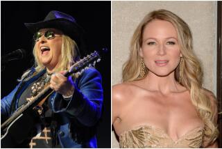 Left, Melissa Etheridge wears a blue blazer and black shirt while playing a black guitar; right, Jewel wears a gold dress