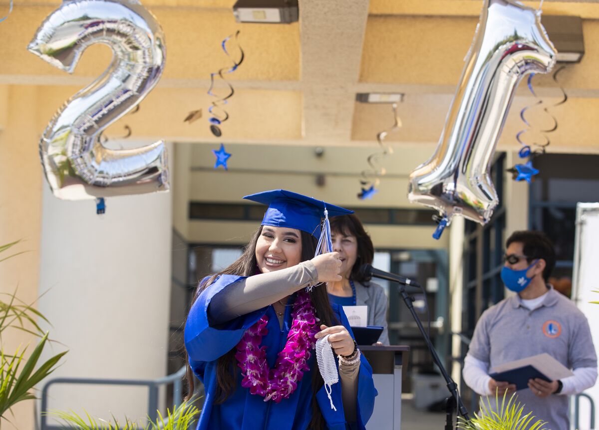 Skylar Brown moves her tassel to the left side of her cap during the Valley Vista High School graduation on Wednesday.