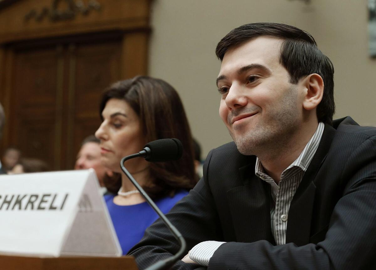 Martin Shkreli, former CEO of Turing Pharmaceuticals, smiles during a House Oversight and Government Reform Committee hearing on Feb. 4.