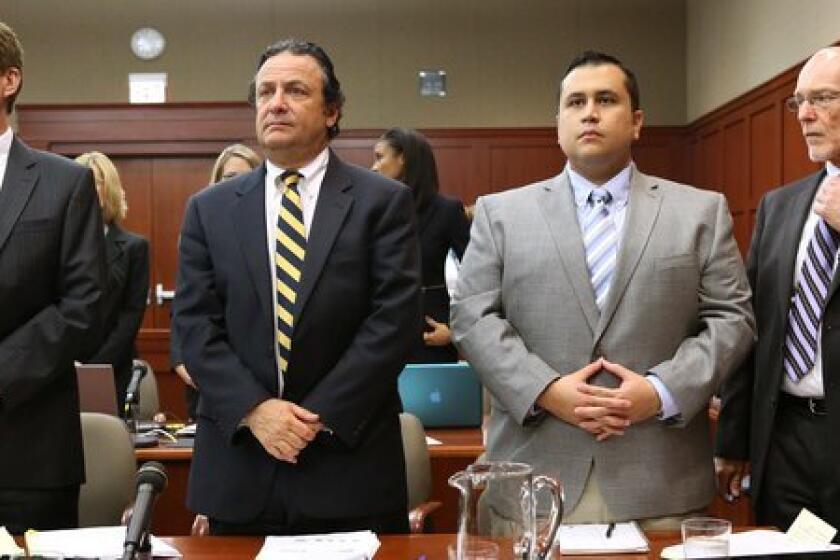 Defense attorney Mark O'Mara (left), with jury consultant Robert Hirschhorn, defendant George Zimmerman and co-counsel Don West (right), in Seminole circuit court on the 3rd day of Zimmerman's trial, in Sanford, Fla., Wednesday, June 12, 2013. Zimmerman is accused in the fatal shooting of Trayvon Martin.(Joe Burbank/Orlando Sentinel/POOL) newsgate CCI B582989857Z.1