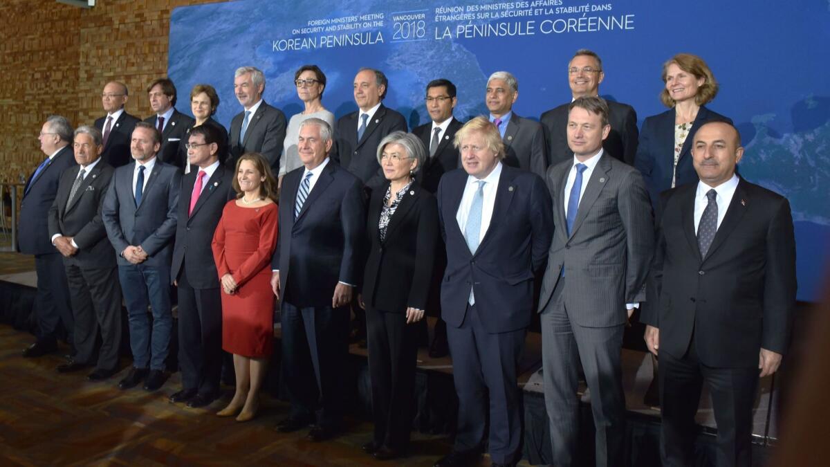 Foreign ministers from 20 countries pose at a meeting in Vancouver, Canada, on Jan. 16, 2018. U.S. Secretary of State Rex Tillerson, front row, fifth from right, co-hosted the event with Canadian Foreign Minister Chrystia Freeland, sixth from right.