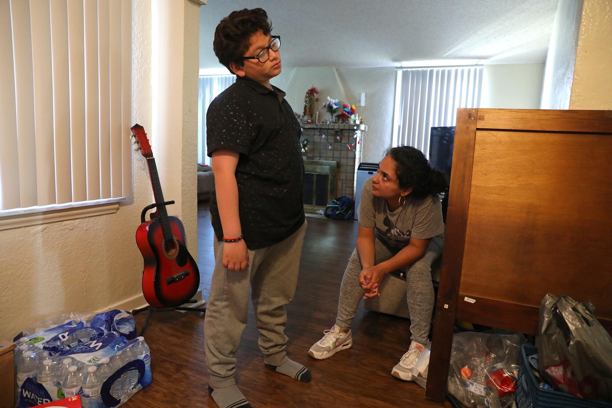 Jacob, left, with mother Ruby, at their home in El Sereno.