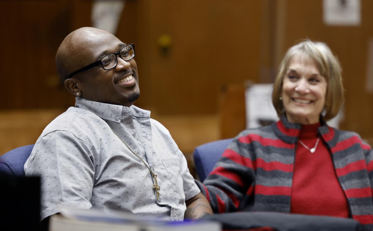 Jofama Coleman, left, reacts to being exonerated