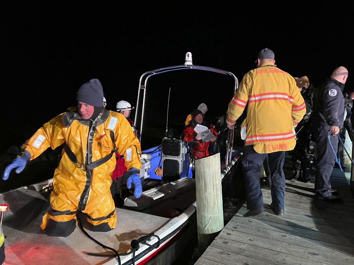 Emergency workers on a boat