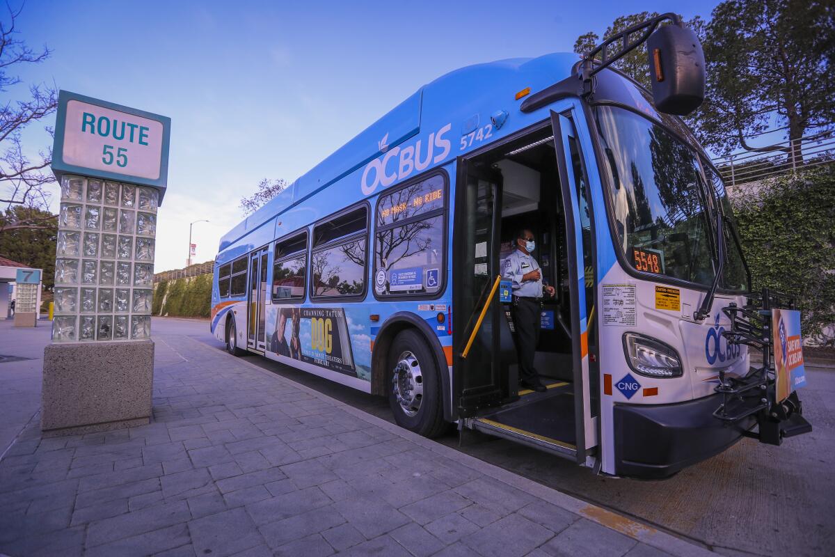 An Orange County Transportation Authority bus driver at the Newport Beach Transit Center.