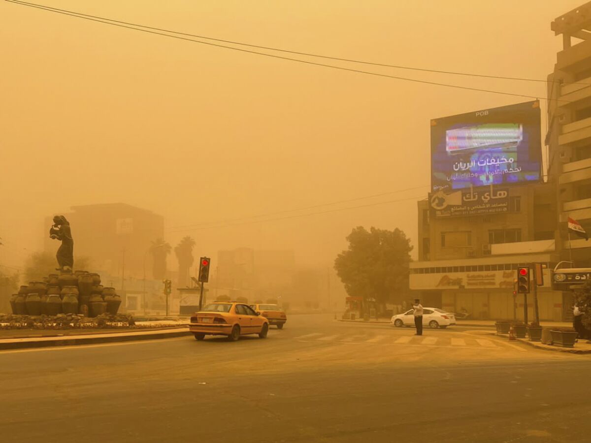 Cars drive through a sand storm in Baghdad, Iraq, Thursday, May 5, 2022. Hundreds of Iraqis with respiratory problems went to hospitals with flights suspended on Thursday as Iraqis awoke to a fifth sand storm to engulf the country within a month. (AP Photo/Ali Abdul Hassan)