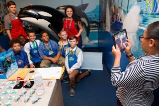 Students in the La Mesa-Spring Valley School District's Extended School Services program visited Junior Achievement BizTown last week. There, Brianna Celaya from La Mesa Dale took a photo of mini SeaWorld employees while acting as photographer for the San Diego Union-Tribune.