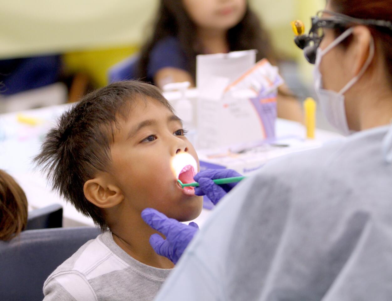 Photo Gallery: Providencia Elementary School students get free dental checkups