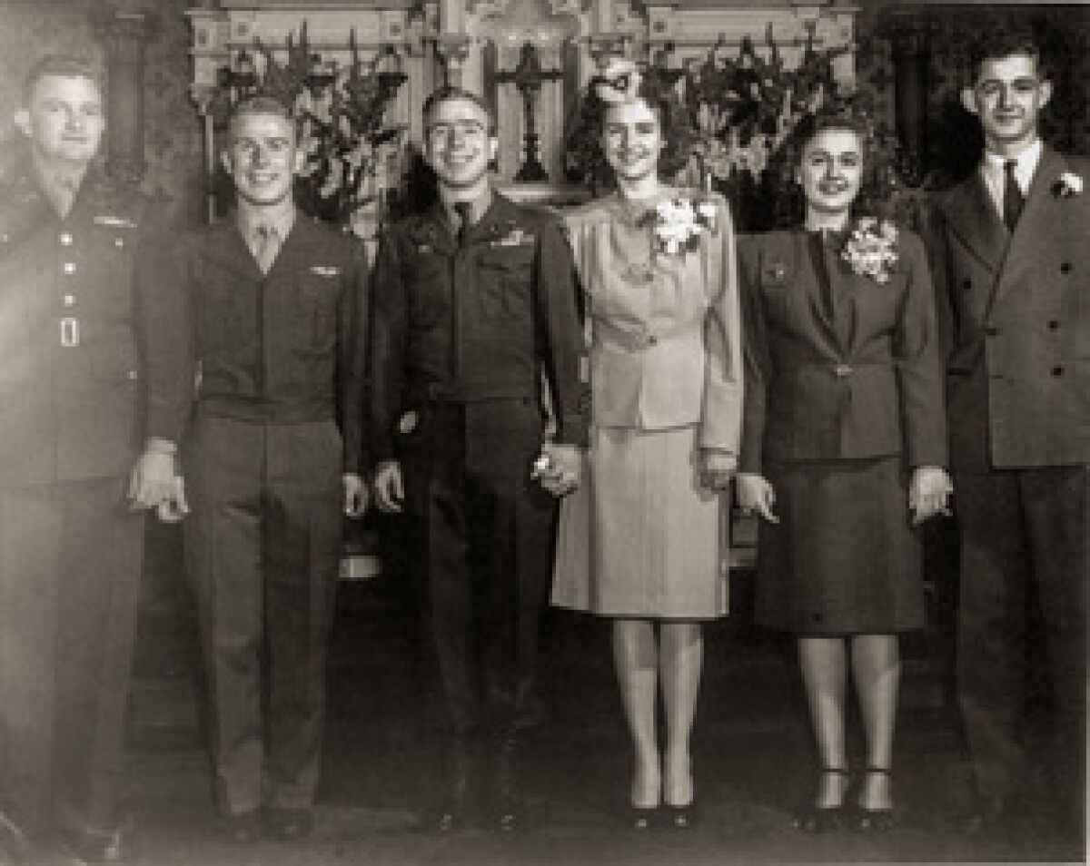 (Center) Joseph Stolmeier and Mary Jo Petersen wedding portrait just after World War II in 1945, with siblings Esther Petersen and Harold Petersen (on right).<br>