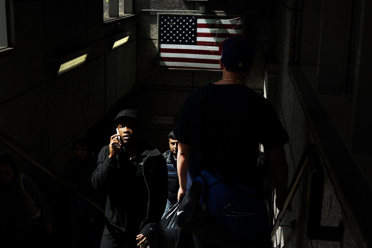 People exit the T subway train blocks away from the scene of Monday's bombing attack at the Boston Marathon.