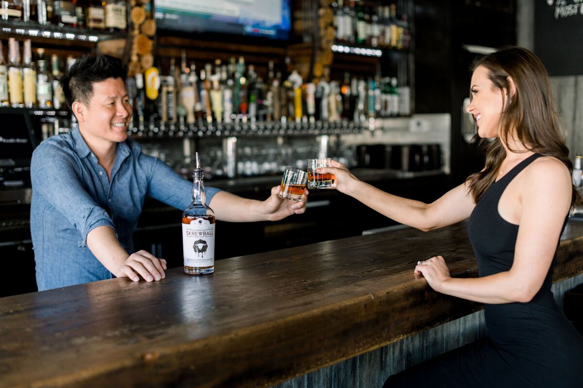  Skrewball Whiskey co-founder Steve Yeng of Ocean Beach, photographed by the Union-Tribune for a profile article in 2018, has announced the company's pledge of up to $500,000 to help laid-off bar workers.
