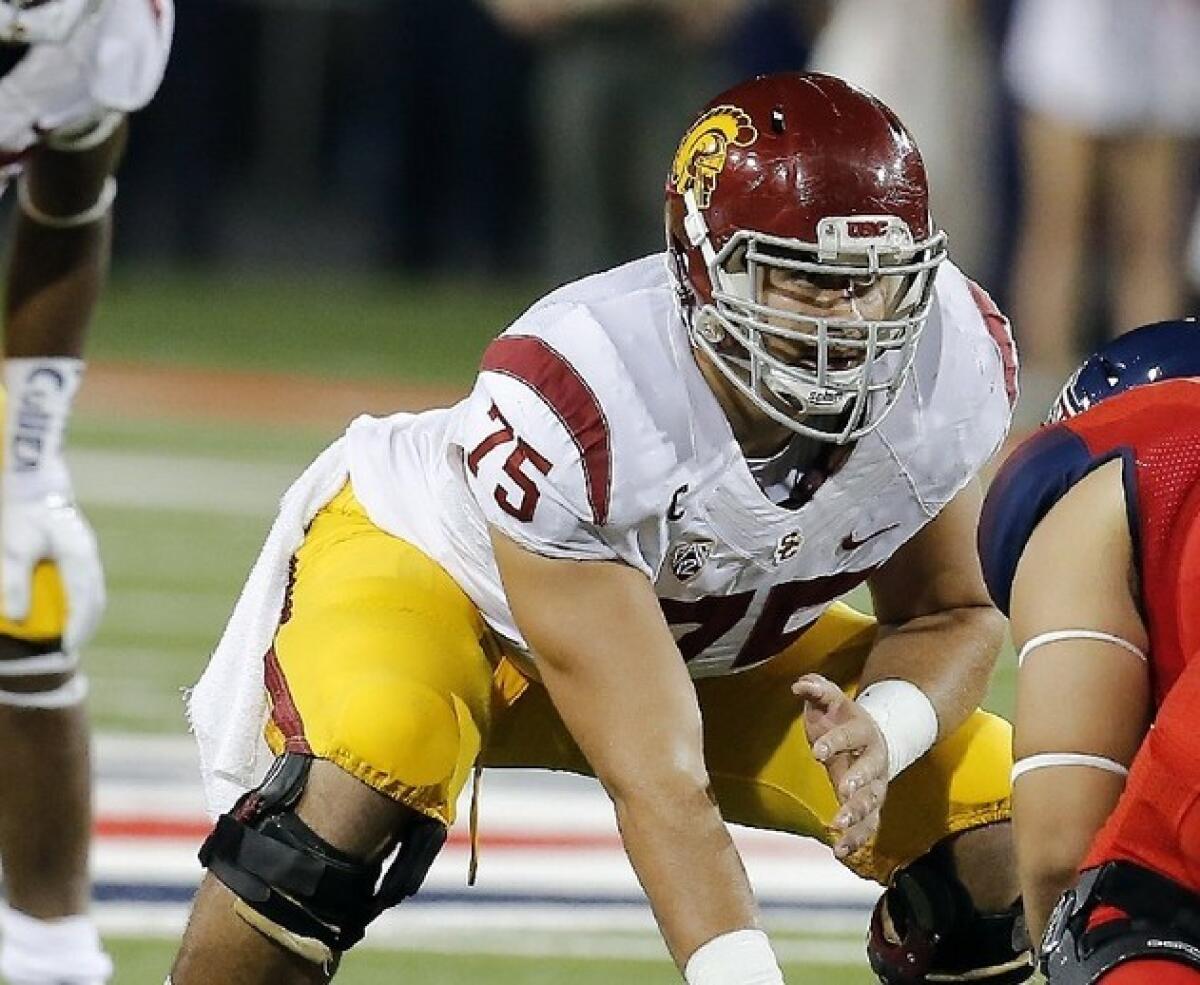 USC center Max Tuerk prepares to snap the ball during a game against Arizona on Oct. 11, 2014.