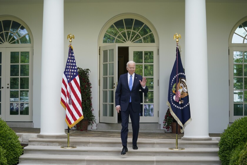 President Joe Biden arrives to speak on updated guidance on face mask mandates and COVID-19 response, in the Rose Garden of the White House, Thursday, May 13, 2021, in Washington. (AP Photo/Evan Vucci)